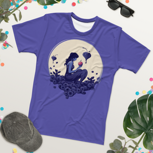 Front view of the Blueberry Crush Tee, showcasing the unique berry-inspired design that celebrates urban culture and hidden narratives. on a table with leafs, glasses and a hat