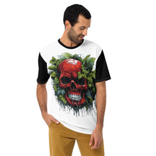 Load image into Gallery viewer, Model casually wearing the Covert Crimson Tee, its bold skull design and subtle motifs making it the perfect emblem for the understated rebel.