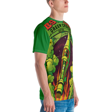Load image into Gallery viewer, Right side view of a man wearing the Green Crack spaceship t-shirt, highlighting its vibrant green hue and playful rocket ship design, a nod to the uplifting Green Crack cannabis strain.