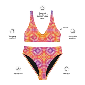 Tie dye two-piece swimsuit folded on table - Graphics 002