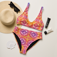Load image into Gallery viewer, Summer setup with back view of tie dye two-piece swimsuit - Hat sunglasses sunscreen and sea shell.