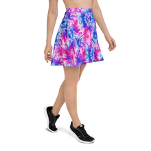 Load image into Gallery viewer, Model posing in vibrant tie-dye cannabis skater skirt.
