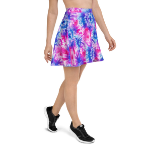 Model posing in vibrant tie-dye cannabis skater skirt.