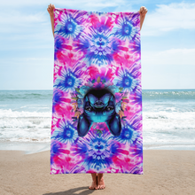 Load image into Gallery viewer, Tie-dye beach towel with cute pug print on table - holding towel upside down funny haha
