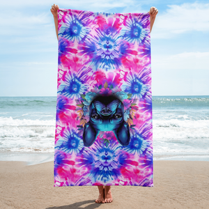 Tie-dye beach towel with cute pug print on table - holding towel upside down funny haha