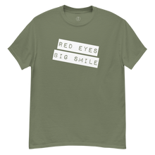 Load image into Gallery viewer, Wrinkled army green Covert Grin Tee, capturing the lived-in look of an agent&#39;s favorite go-to piece.