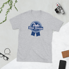 Load image into Gallery viewer, Dabs Blue Dream Sativa T-Shirt | Short-Sleeve T-Shirt | Strains Collection | Cannabis Incognito Apparel CIA | Flat T-shirt Mock Up Model Table Top Camera, Glasses, Phone