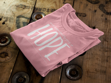 Load image into Gallery viewer, Pink Tee Folded on Wood - Whisper of Whimsy