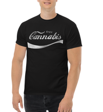 Load image into Gallery viewer, Male model wearing a black cannabis-themed shirt, showcasing its trendy and popular appeal.