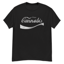 Load image into Gallery viewer, Male model wearing a black cannabis-themed shirt, showcasing its trendy and popular appeal.