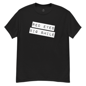 Step up your style game with the RED EYES BIG SMILE T-Shirt - Black Shirt laid out - Agent Green Thumb's Trendy Cannabis T-Shirt for Conquering Villains - Flat laid oput