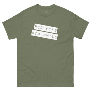 Funny Weed Shirt: Spread Love and Compassion with RED EYES BIG SMILE - Army Green Flat Laid out